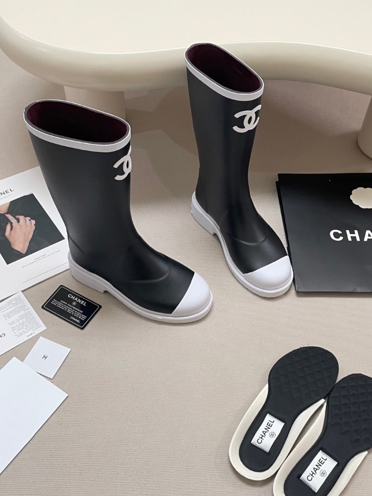 Black and white C rain Boots preorder