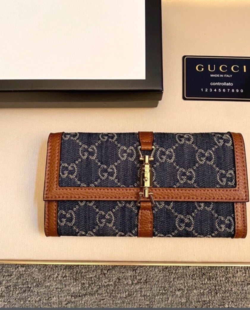Dark denim G with brown crossbody bag