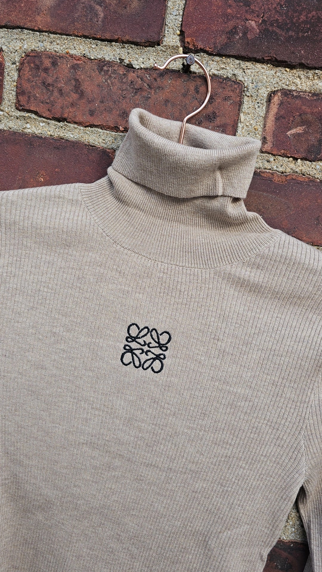 Taupe and white ribbed turtlenecks run small