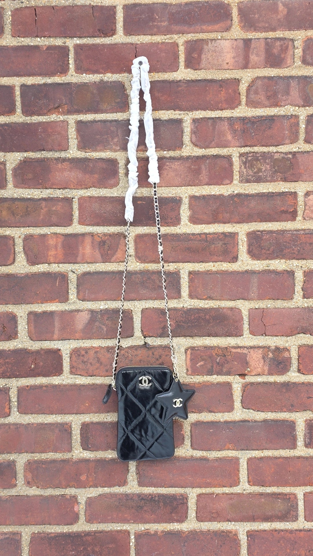 C black shiny Phone Bag with star mirror in stock