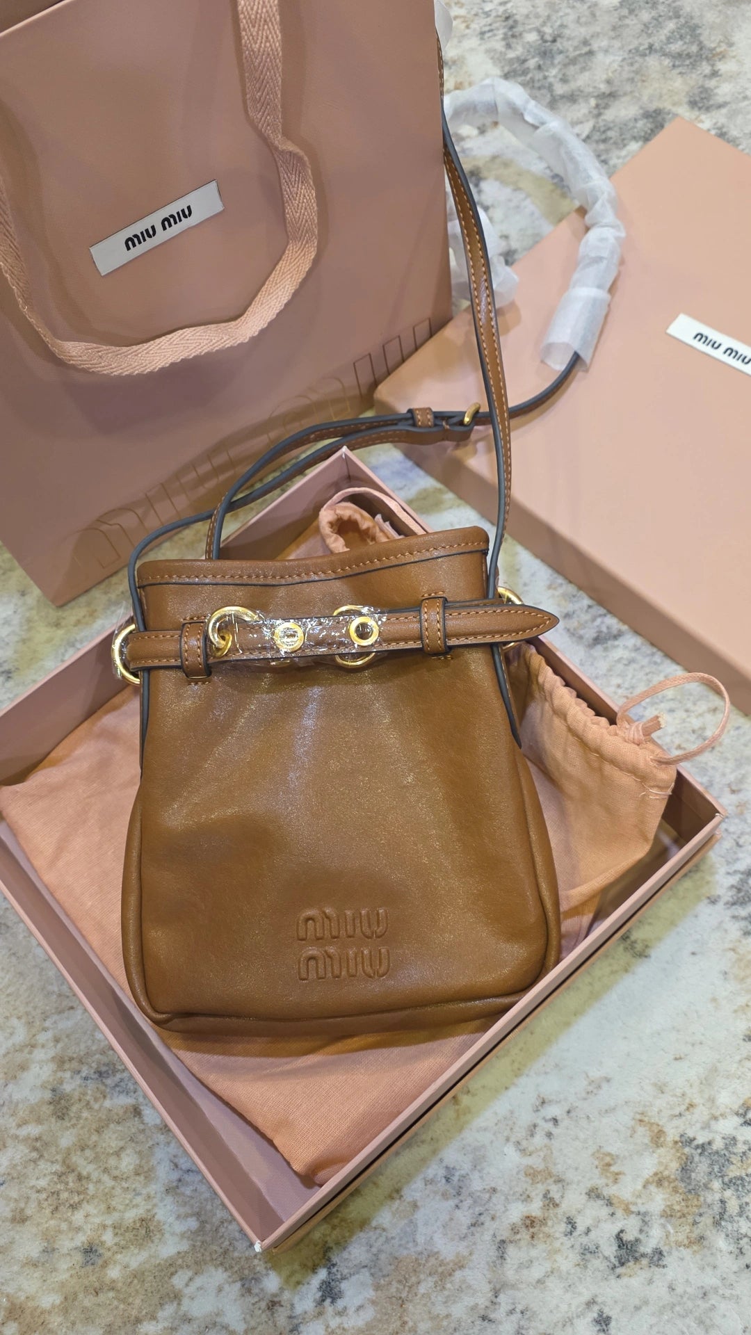 MM H luggage brown crossbody phone bag preorder