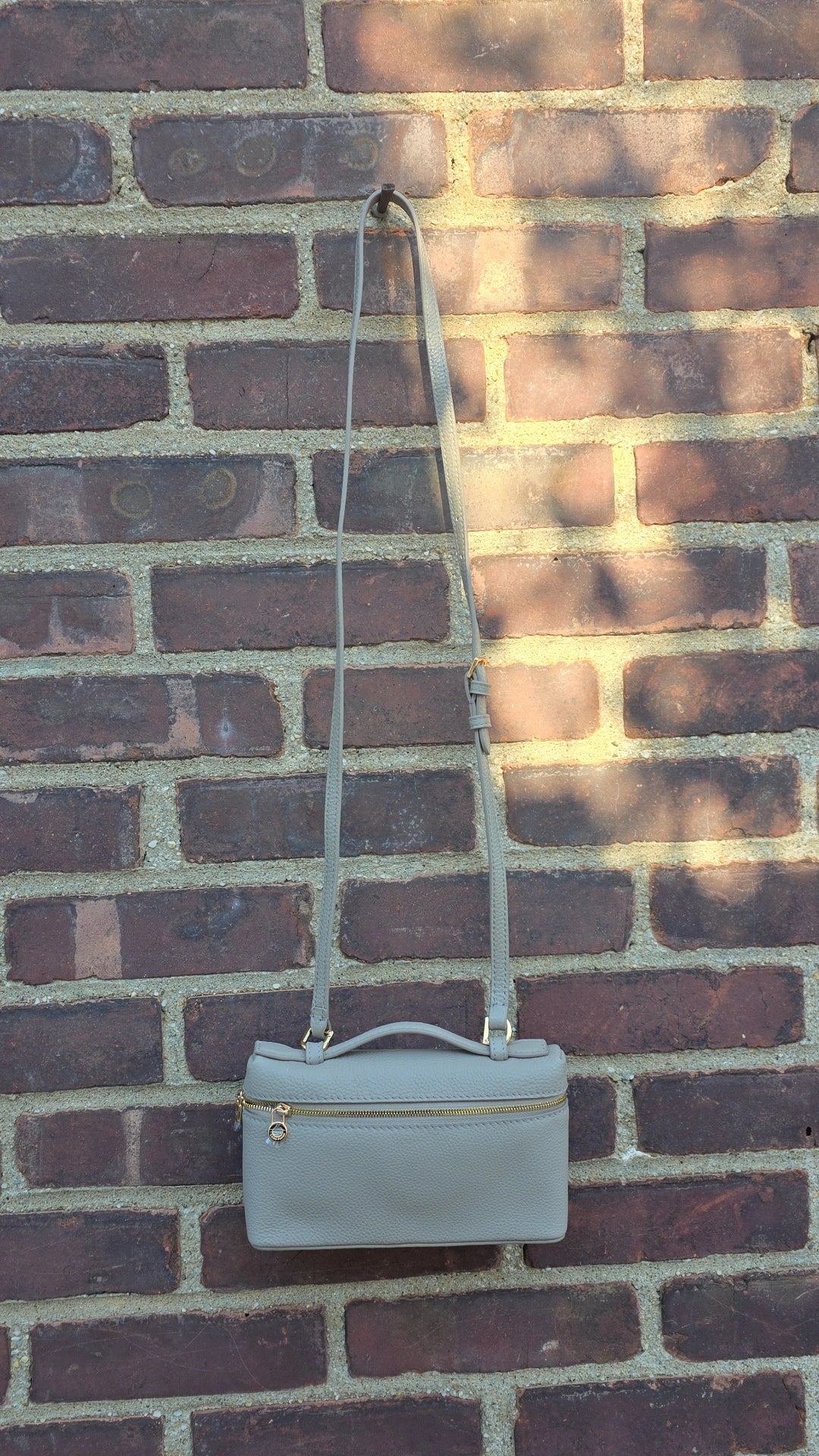 LP taupe crossbody bag in stock
