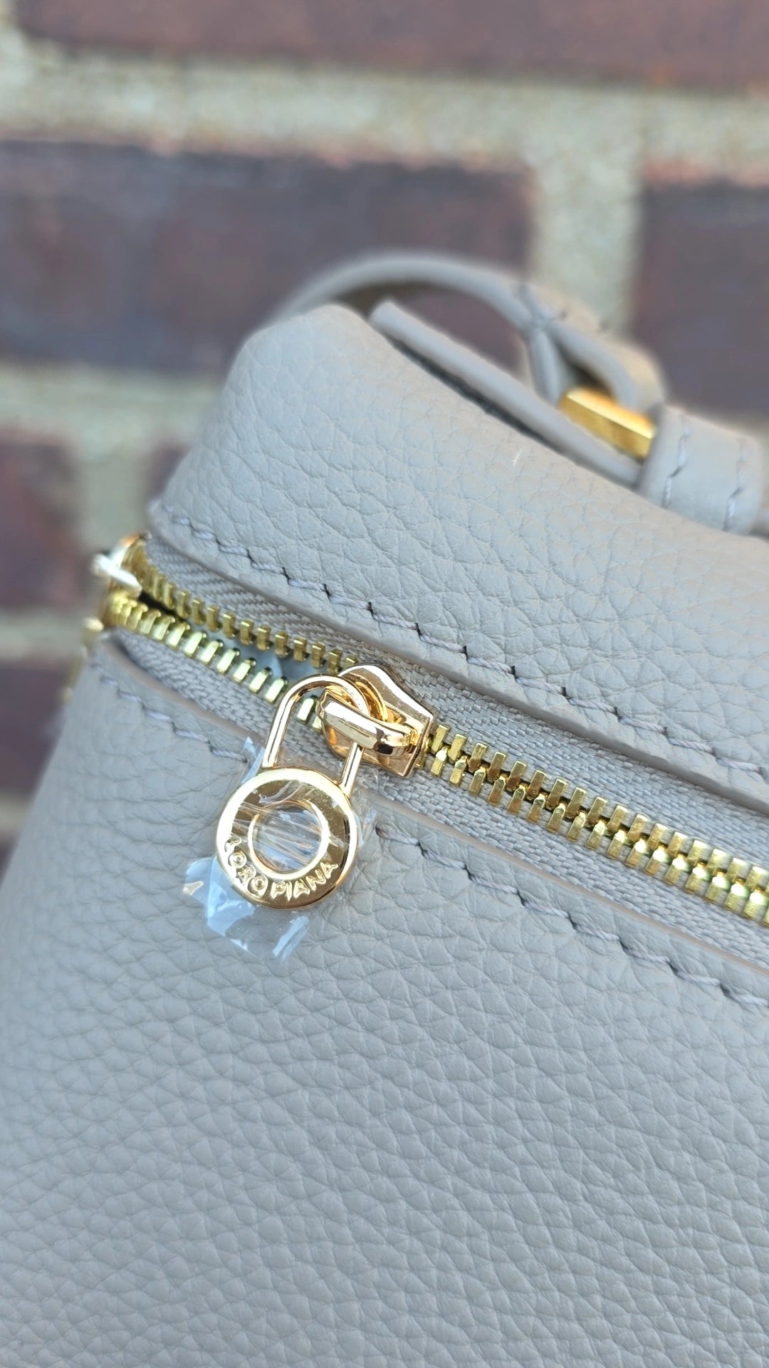 LP taupe crossbody bag in stock