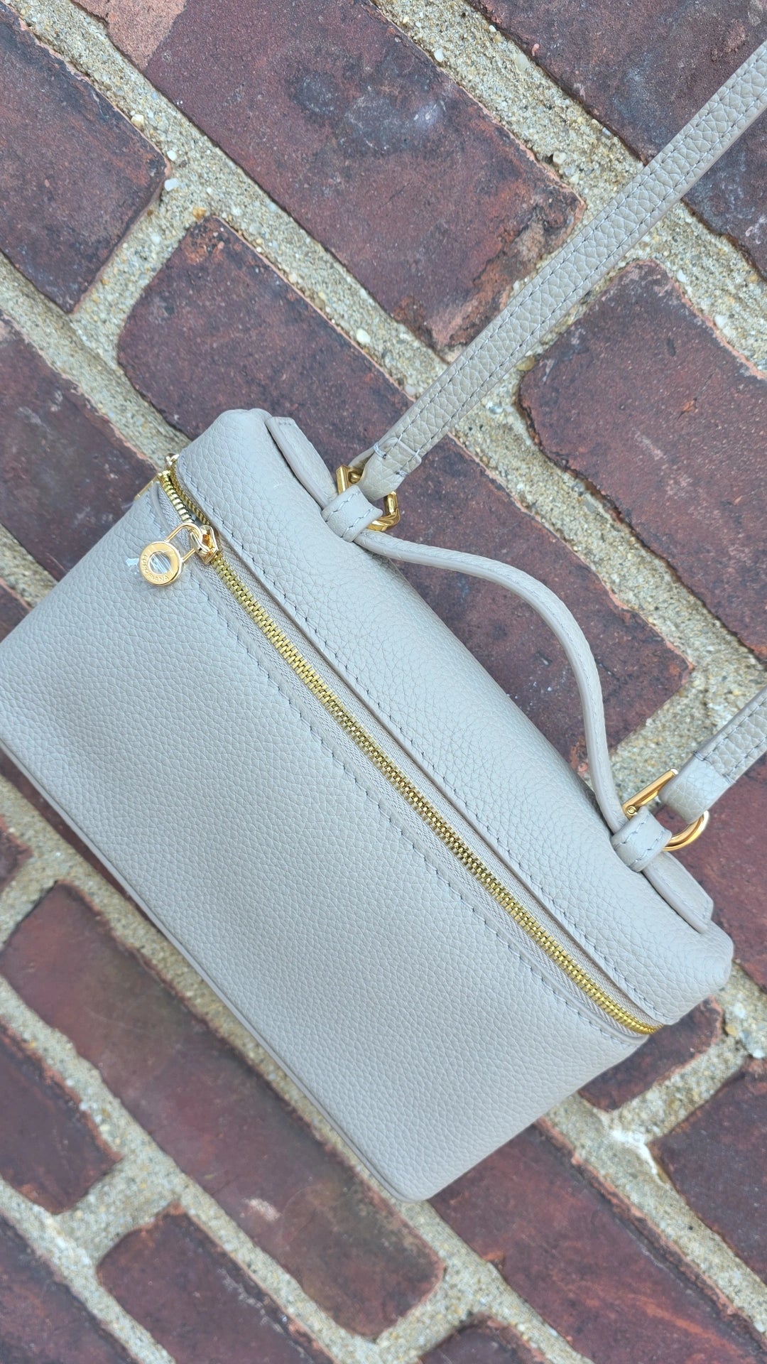 LP taupe crossbody bag in stock