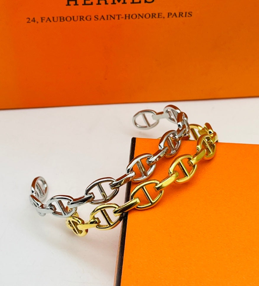 H links stainless steel gold and platinum plated bangle