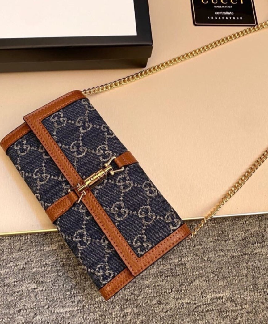 Dark denim G with brown crossbody bag