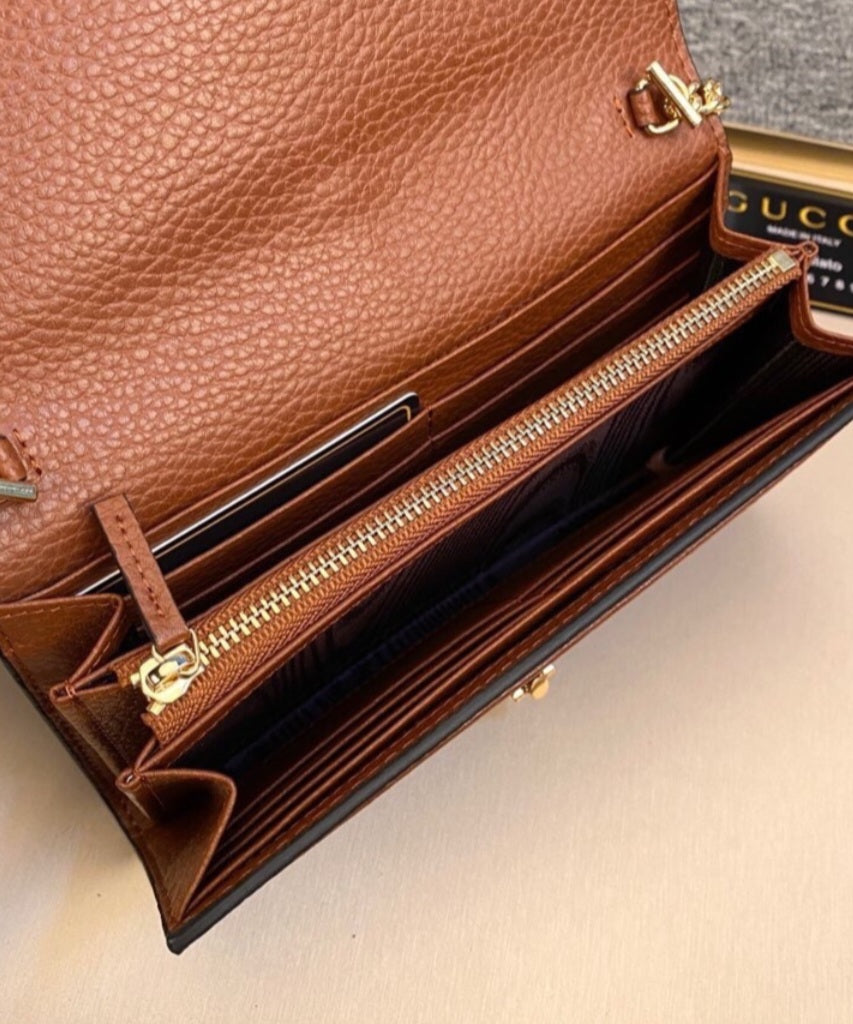 Dark denim G with brown crossbody bag